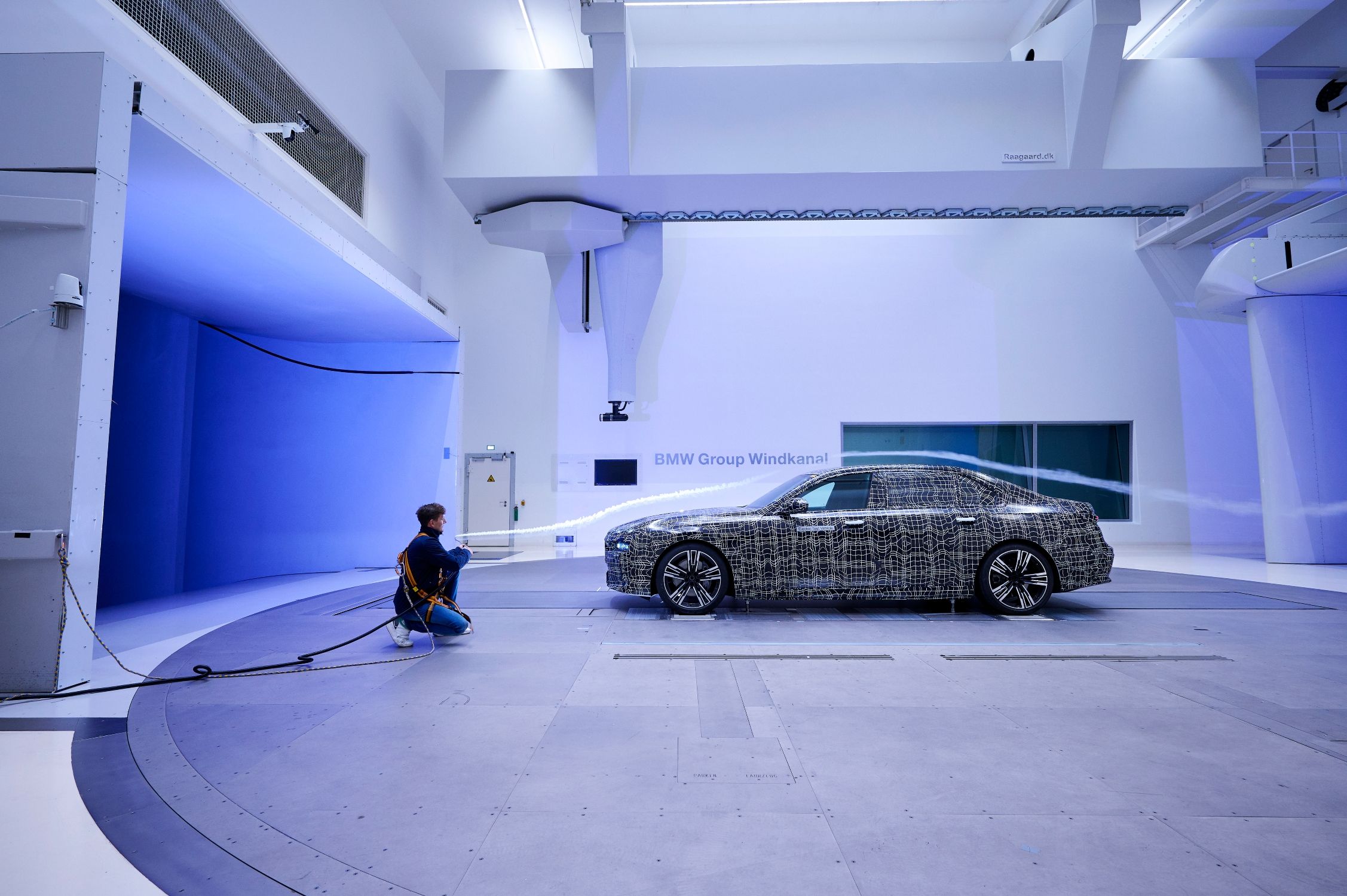 The vehicle's aerodynamic package is examined in the wind tunnel