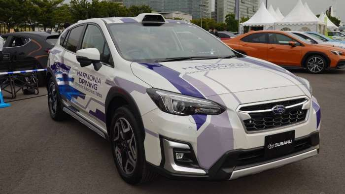 Subaru's Harmonia Drive test vehicle equipped with six additional cameras (eight cameras total) around the vehicle, and an InnovizOne lidar sensor on the roof