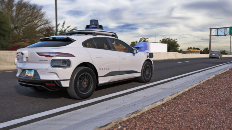 Waymo's autonomous Jaguar I-Pace robotaxi on the freeway