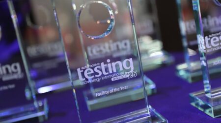 The ATTI Awards Facility of the Year 2025 trophy pictured on a table among other awards, at the awards ceremony.