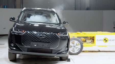 Euro NCAP flags safety flaws in new models and highlights top-rated vehicles A vehicle undergoing a crash test in a controlled indoor testing environment.