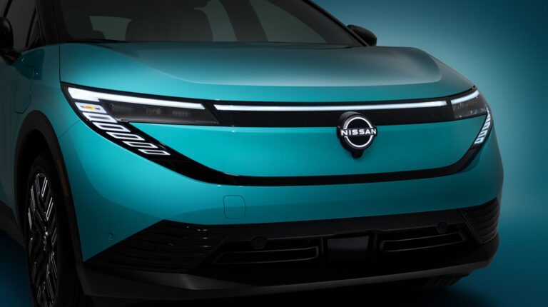 A green third-generation Nissan Leaf shown in a promo pic against a green and black background