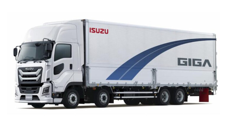 An Isuzu heavy-duty Giga truck shown in profile pic against a white background