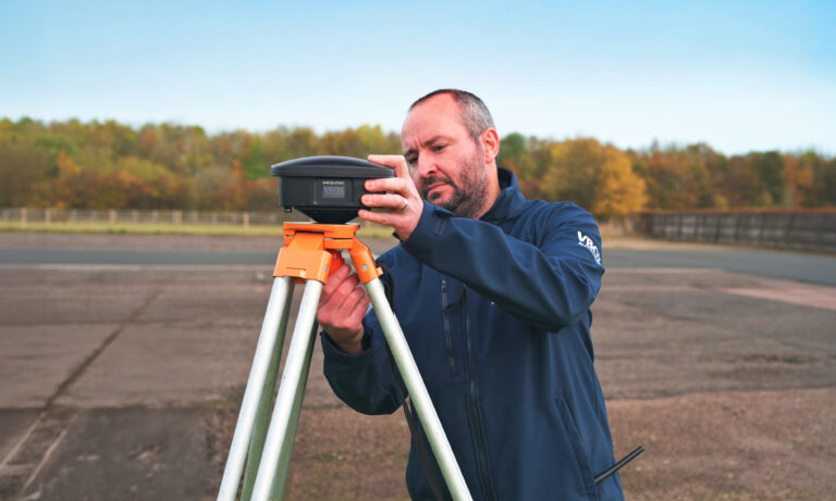 VBox Automotive expands GNSS test equipment range An engineer sets up the new VBOX Automotive NTRIP Base Station at a test track.