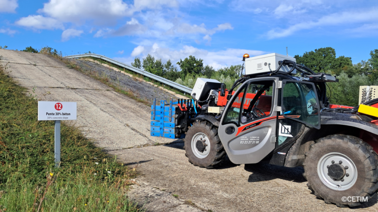 CETIM selects HBK’s Aqira platform to support EV R&D An off-highway electric vehicle drives up a steep incline.