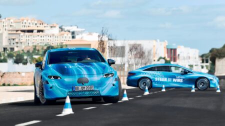 Mercedes‑Benz adds steer-by-wire to EQS A Mercedes‑Benz EQS in blue and turquoise color scheme undergoing testing on a test track.
