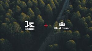 Kodiak AI and West Fraser Timber logos on an image of Canadian forest.