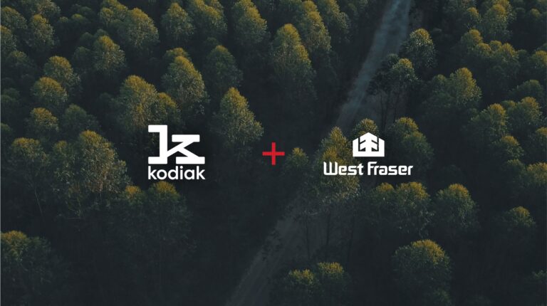 Kodiak AI and West Fraser Timber logos on an image of Canadian forest.