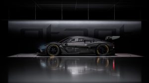 Profile photo of the new Genesis Magma GT3 Concept in a dark black showroom.
