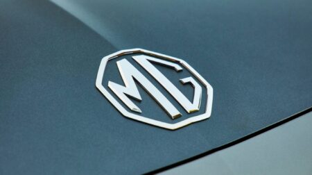 MG logo on a dark grey vehicle.