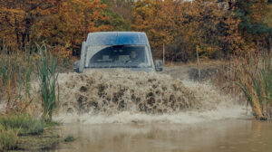 The Terrastorm 4x4 HD wades through water.