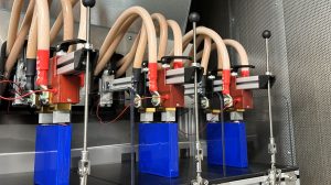 Electric vehicle batteries being tested in a laboratory.
