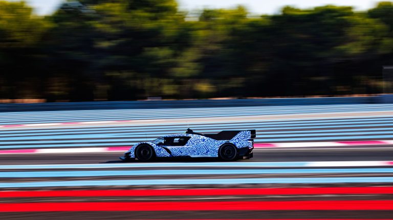 Ford Hypercar drives along a test track.